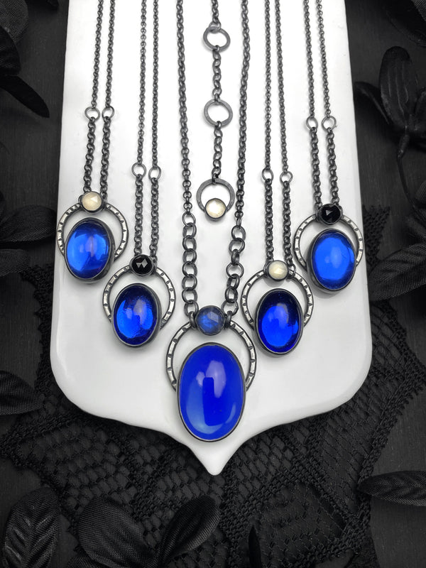Deep Blue Orbit Necklaces - 1 left: C