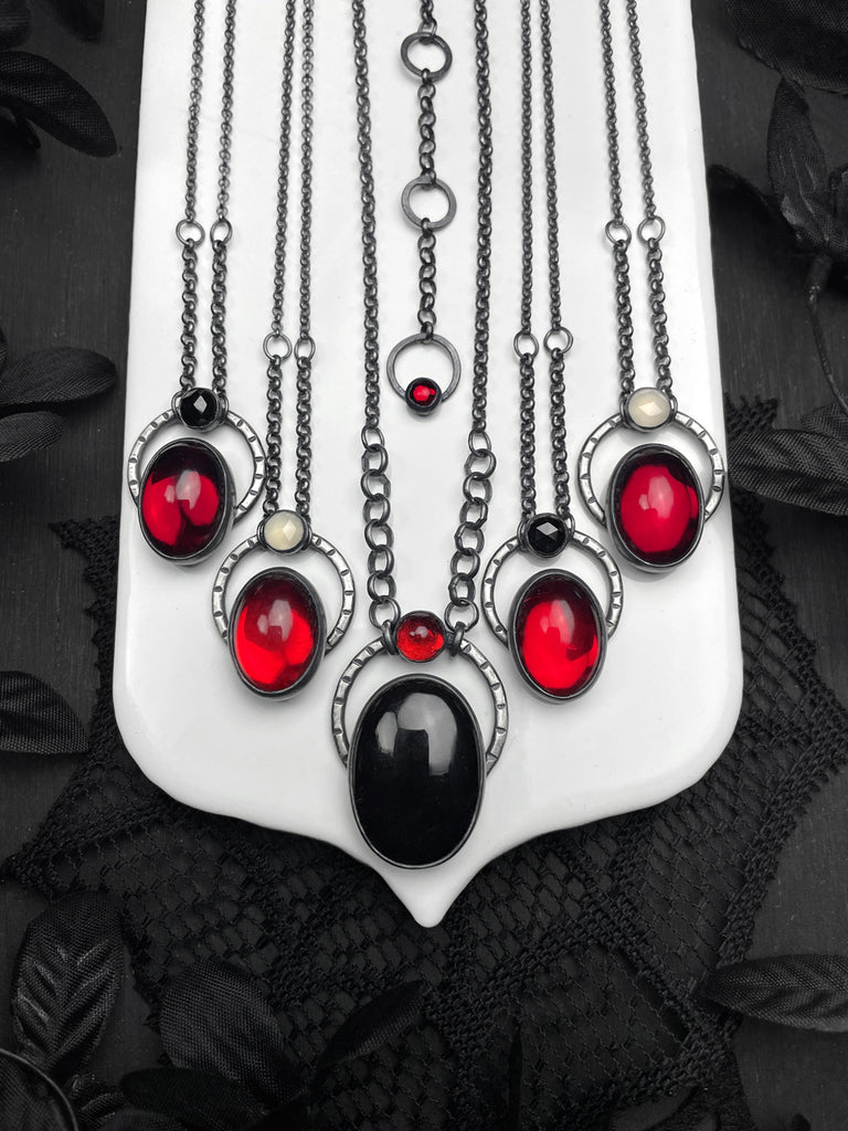 Red Orbit Necklaces
