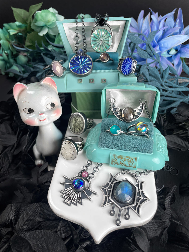 SHADOWY ATOMIC JEWELRY