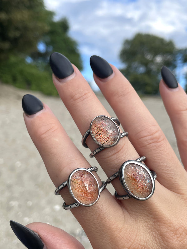 Glowing Sunstone Orbit Rings - 3 available in sizes 7.5, 8.5 & 9.5