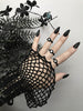 Zoomed out view of 3 simple matte black rings with white swarovski crystal stones, displayed on a gothic model's hand with long black nails. 3d printed jewelry by Hypnovamp.