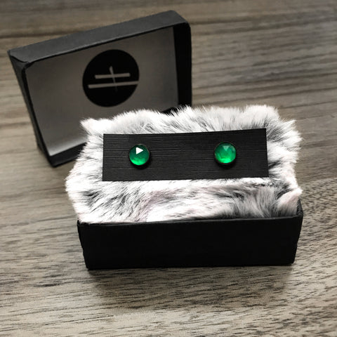 Witchy style stud earrings featuring oxidized sterling silver & rose-cut green onyx. Displayed in black jewelry box with grey fur. Minimalist gothic jewelry handmade in Salem, MA by jewelry designer Hypnovamp.