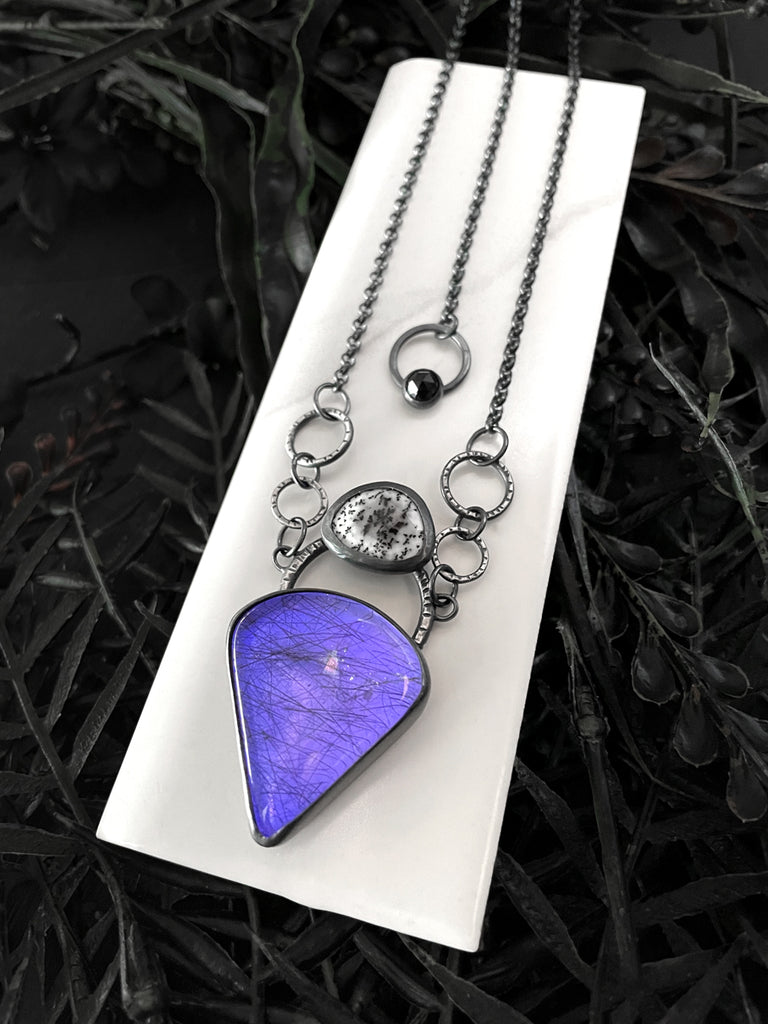 Rutilated Quartz Amulet with Purple Glow