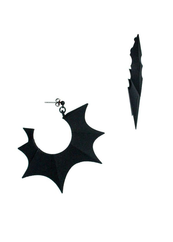 Side view of big gothic black bat wing hoop earrings displayed on a white background. 3d printed jewelry by Hypnovamp.